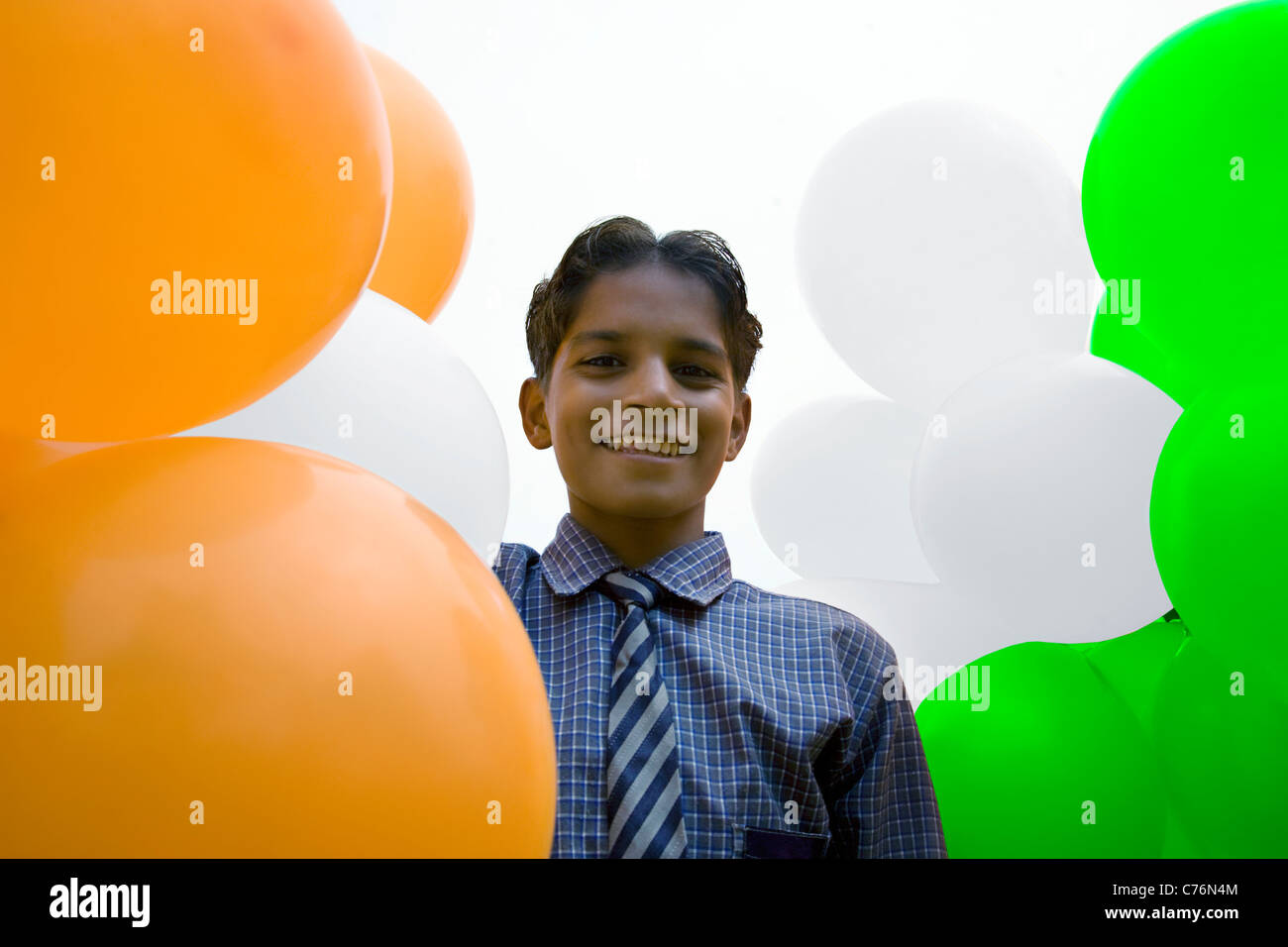 Portrait of a school boy with balloons Stock Photo
