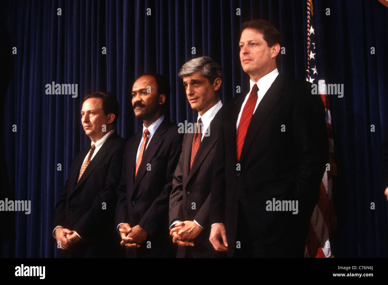 (L-R) Lawrence Summers, Franklin Raines, Robert Rubin and Al Gore during a news conference Stock Photo
