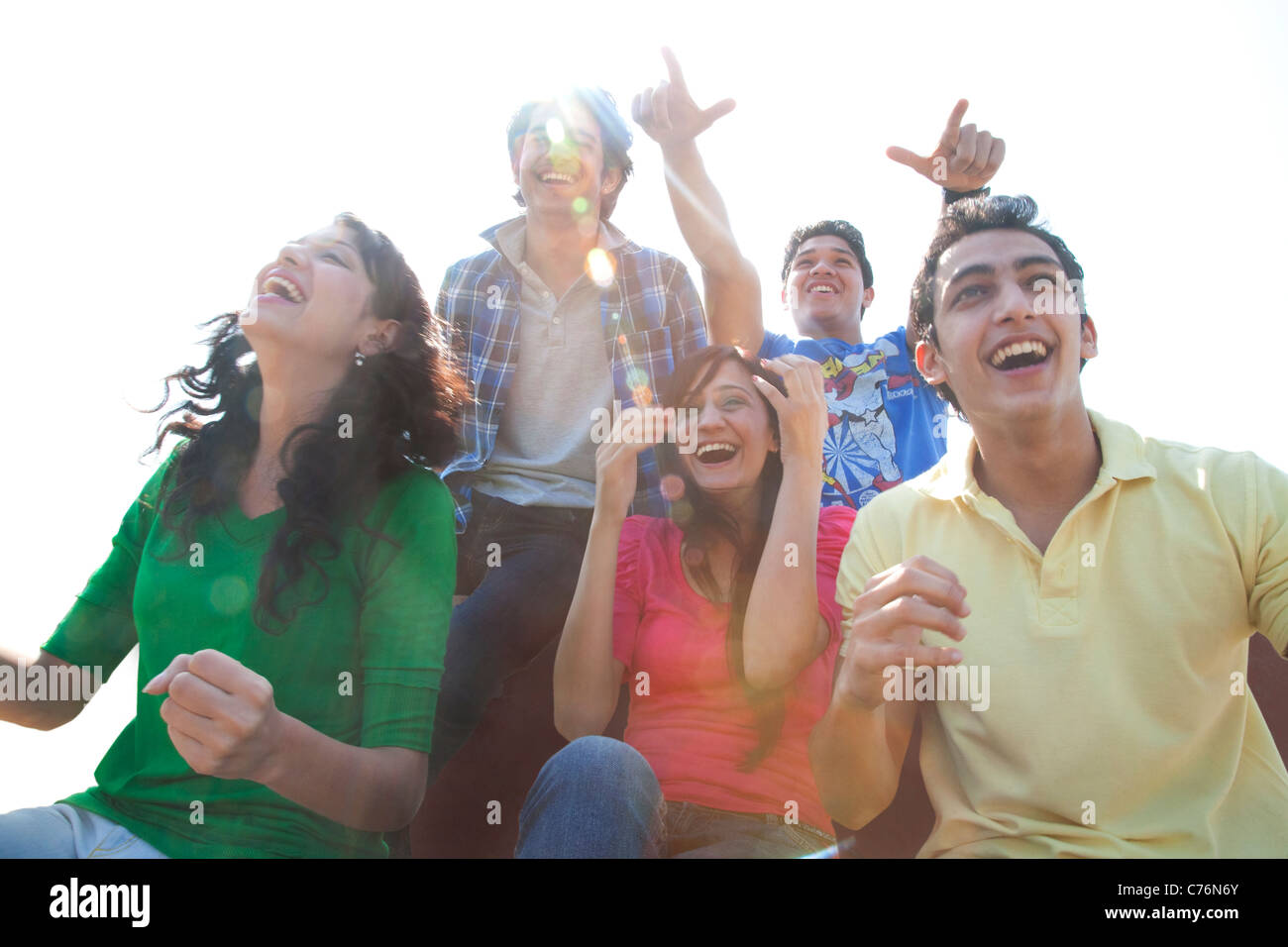 Youngsters cheering Stock Photo