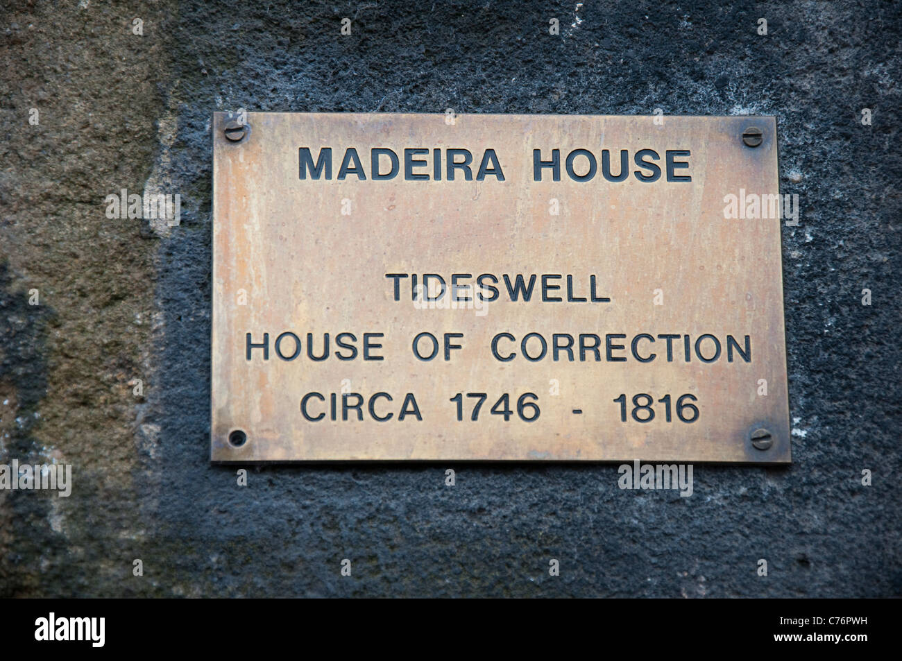 A plaque outside the Madeira House of Correction, Tideswell Derbyshire England UK Stock Photo