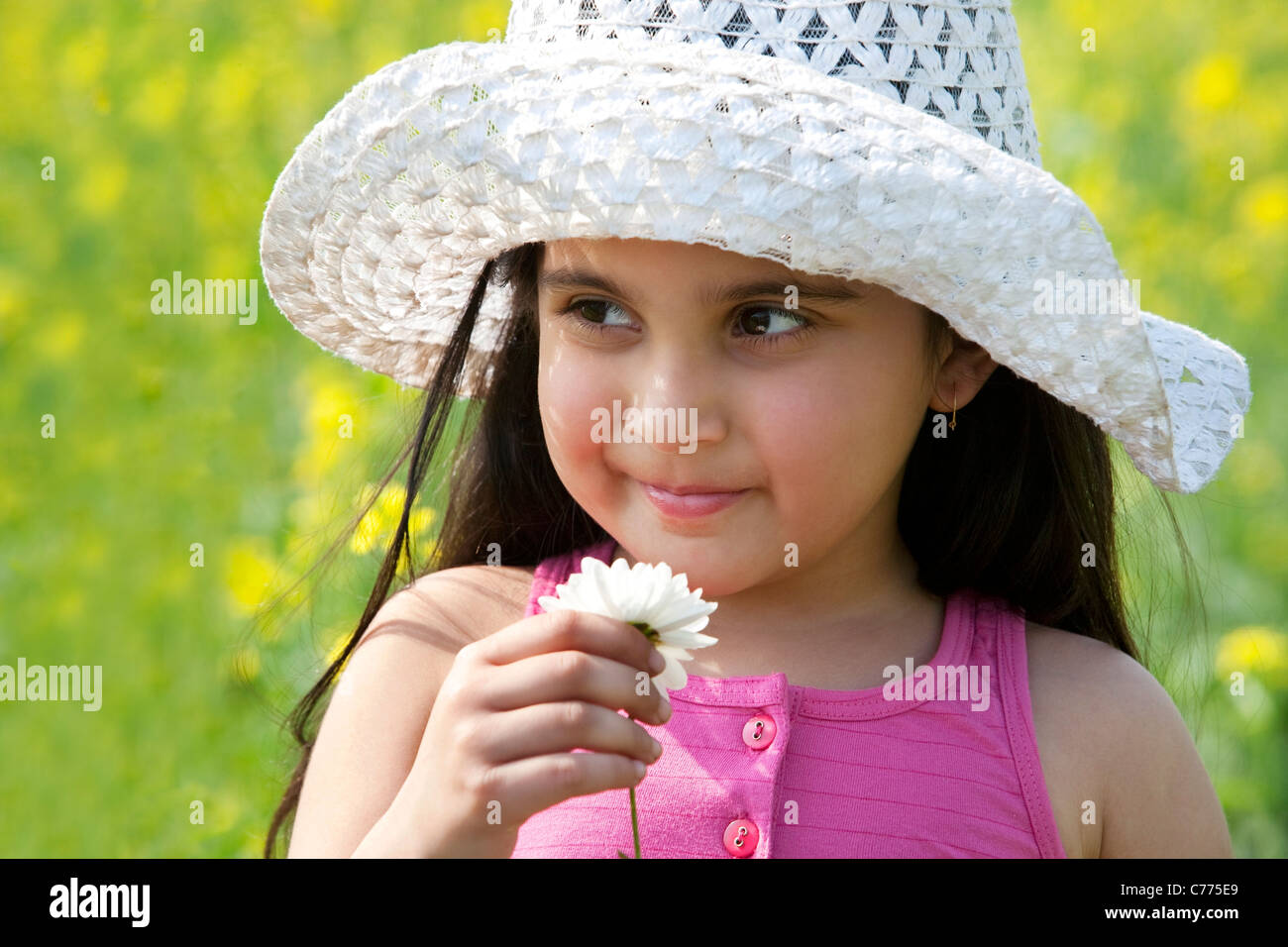 Young girl with a flower Stock Photo