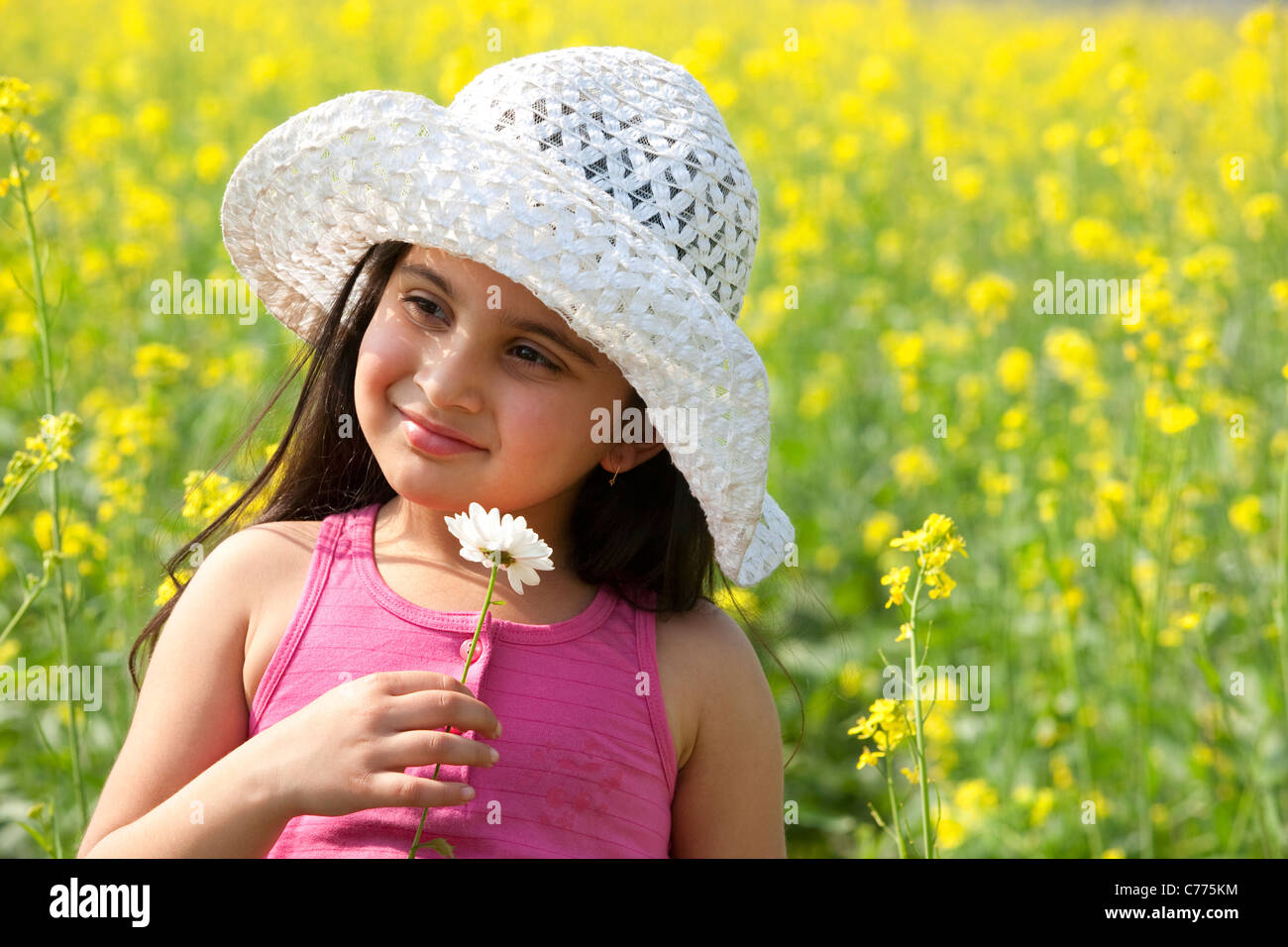 Young girl with a flower Stock Photo