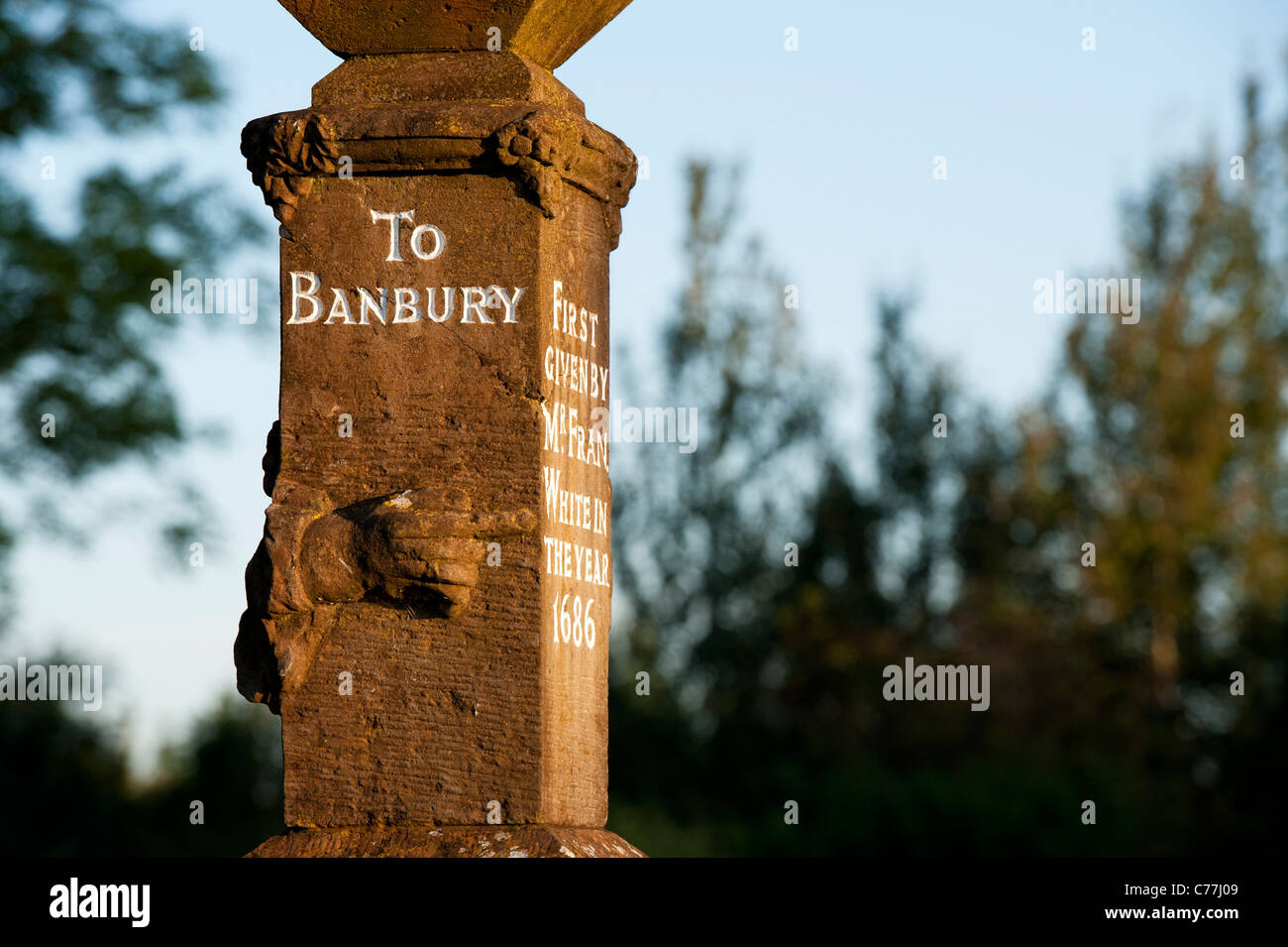 Wroxton guide post / dated way marker . Historical roadsigns in Banbury area. Oxfordshire. England Stock Photo