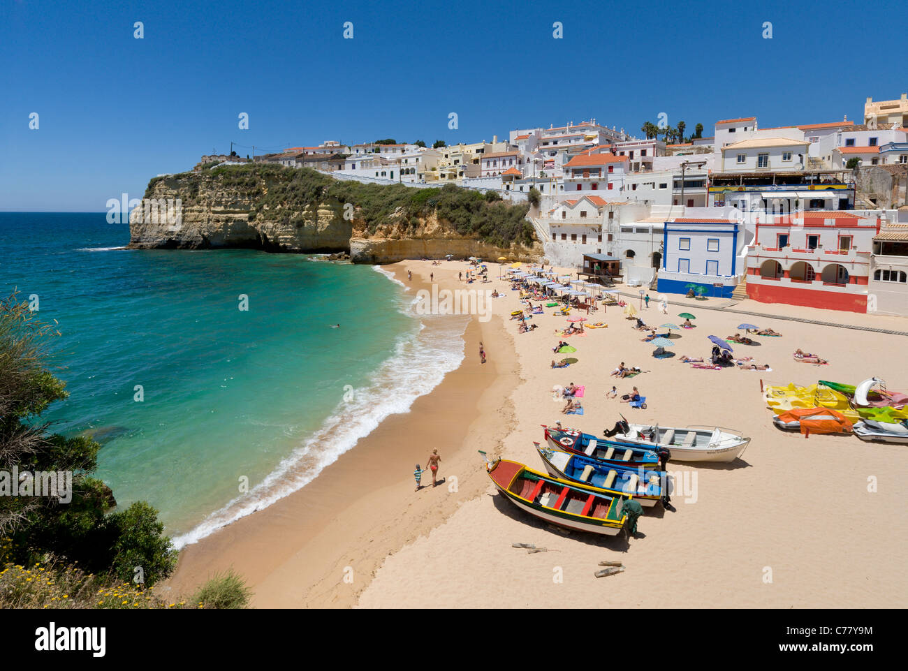 Portugal, the Algarve, Praia do Carvoeiro town and beach with fishing boats Stock Photo