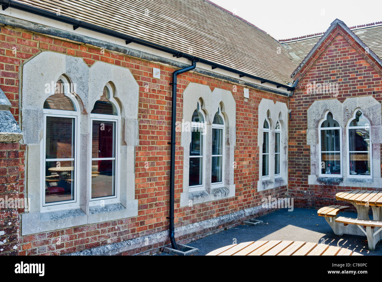 Part of old Victorian village school building in Corfe Mullen Dorset UK