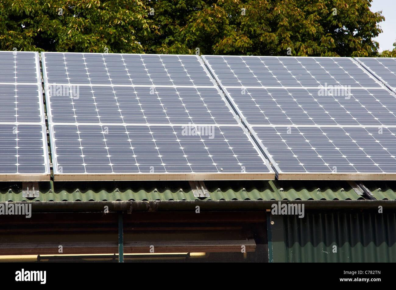 Photovoltaic solar panels on the roof of an eco-friendly building Stock Photo