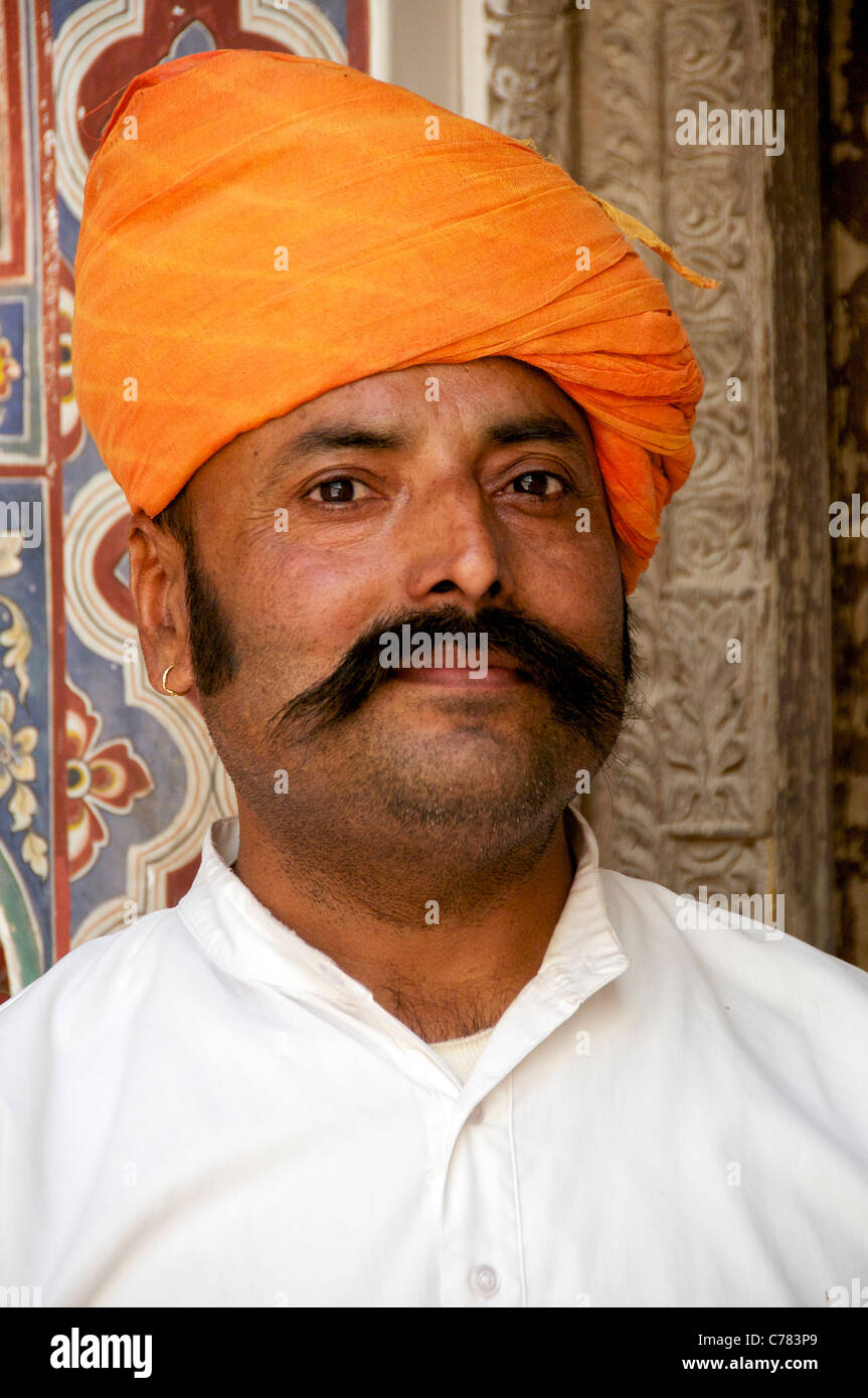 Portrait man with orange turban Castle Mandawa Shekhawati Northern Rajasthan India Stock Photo