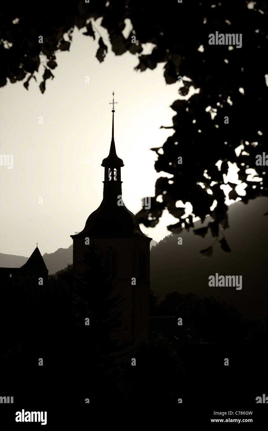 church steeple in Gruyeres Switzerland in early morning Stock Photo