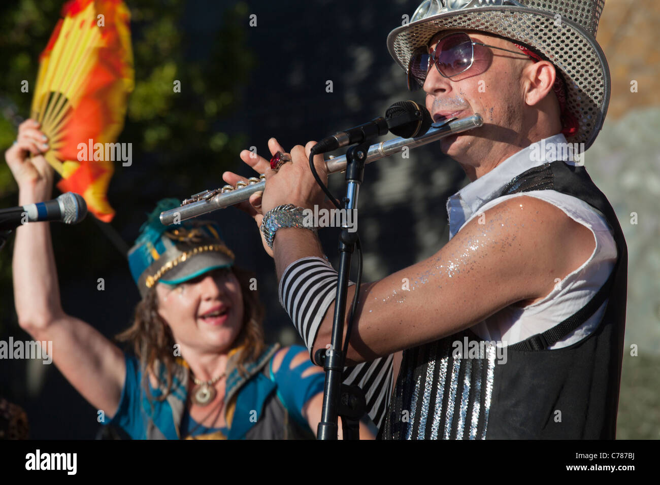 Flutist playing solo, March Fourth Marching Band performance at 2011 Bumbershoot, Seattle Center, Seattle, Washington, USA Stock Photo