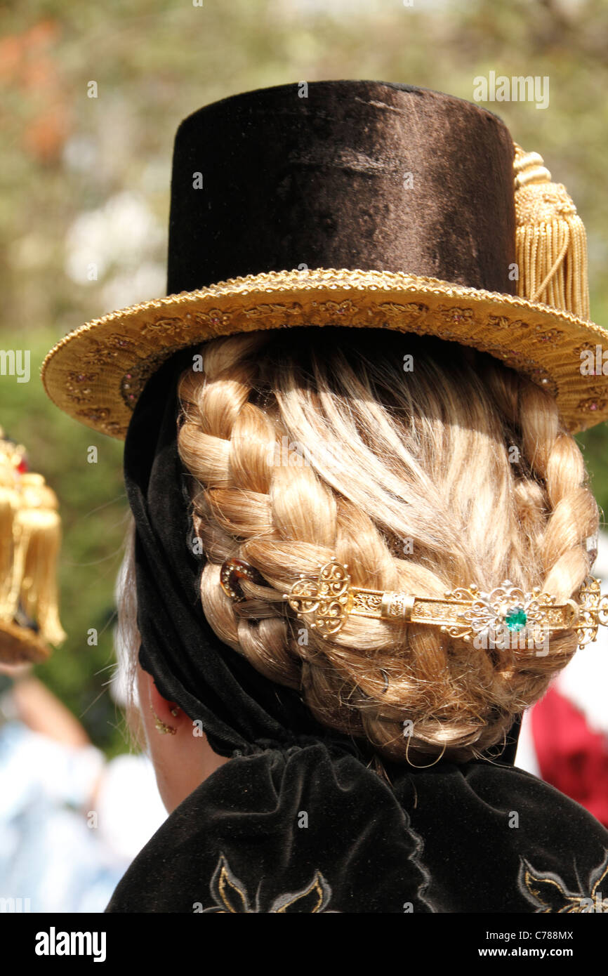 Ladies traditional hair and hat at the 