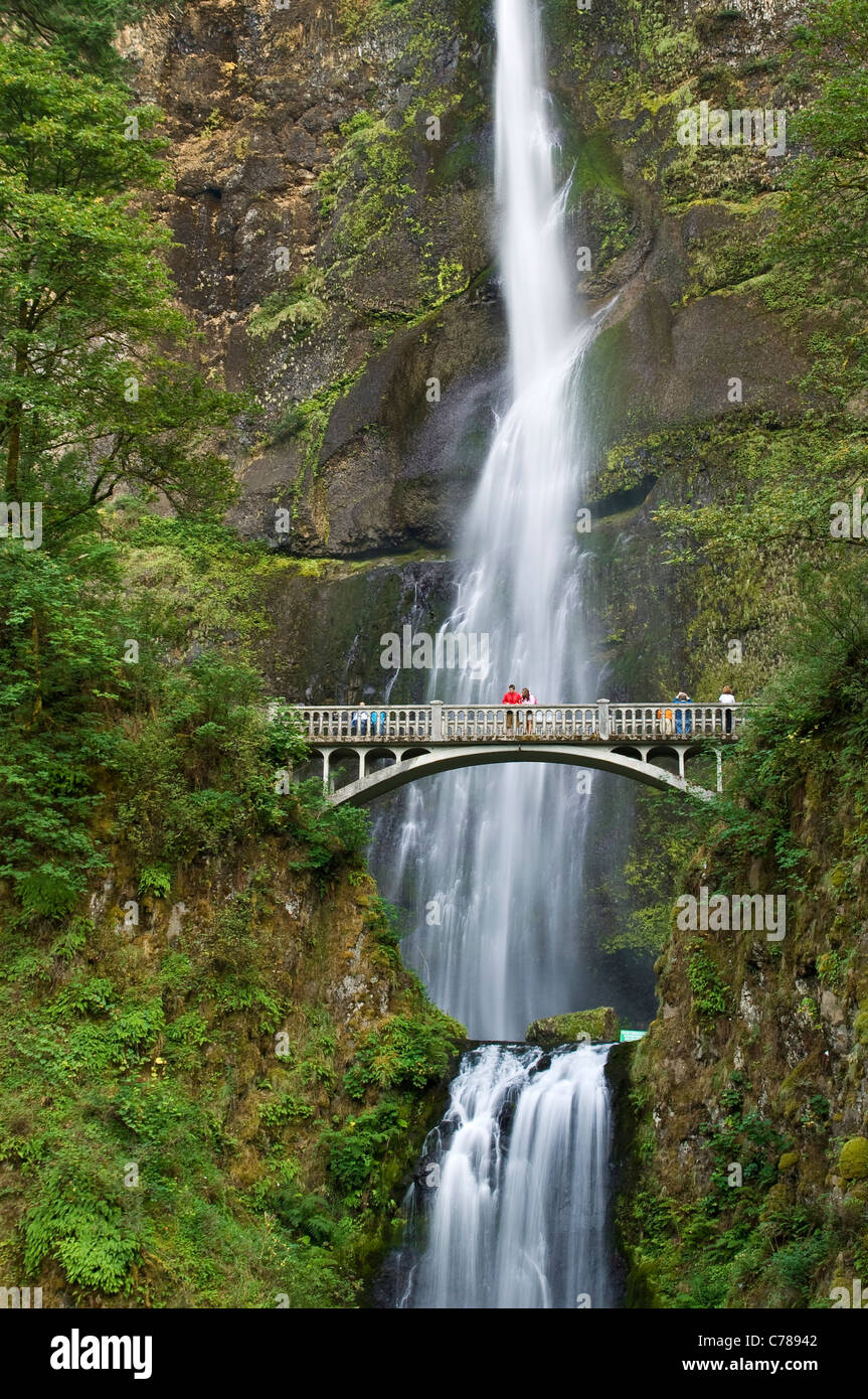 Multnomah Falls, with visitors on Benson Bridge; Columbia River Gorge National Scenic Area, Oregon. Stock Photo