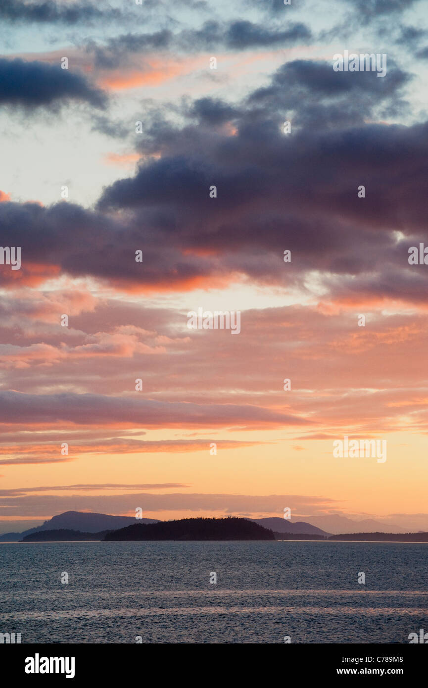 A beautiful sunset view of the San Juan Islands in the Puget Sound area ...