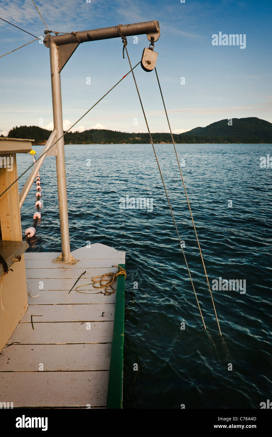 Winches, cables, and ropes make up a reefnet salmon fishing boats ...