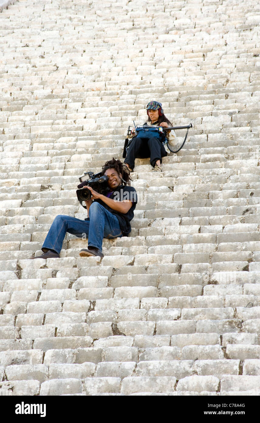 Documentary Crew filming from the steps of Chichen  Itza in Mexico's Yucatan Peninsula Stock Photo