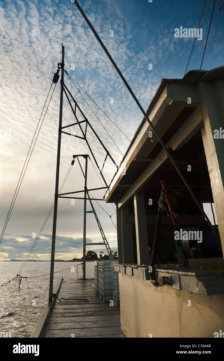 Winches, cables, and ropes make up a reefnet salmon fishing boats ...