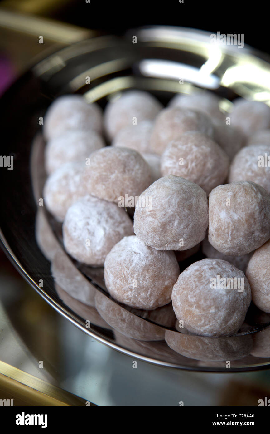 Bolicocos, or coconut balls, a common sweet found on Peru's northern coast  in towns such as Chiclayo and Lambayeque Stock Photo - Alamy