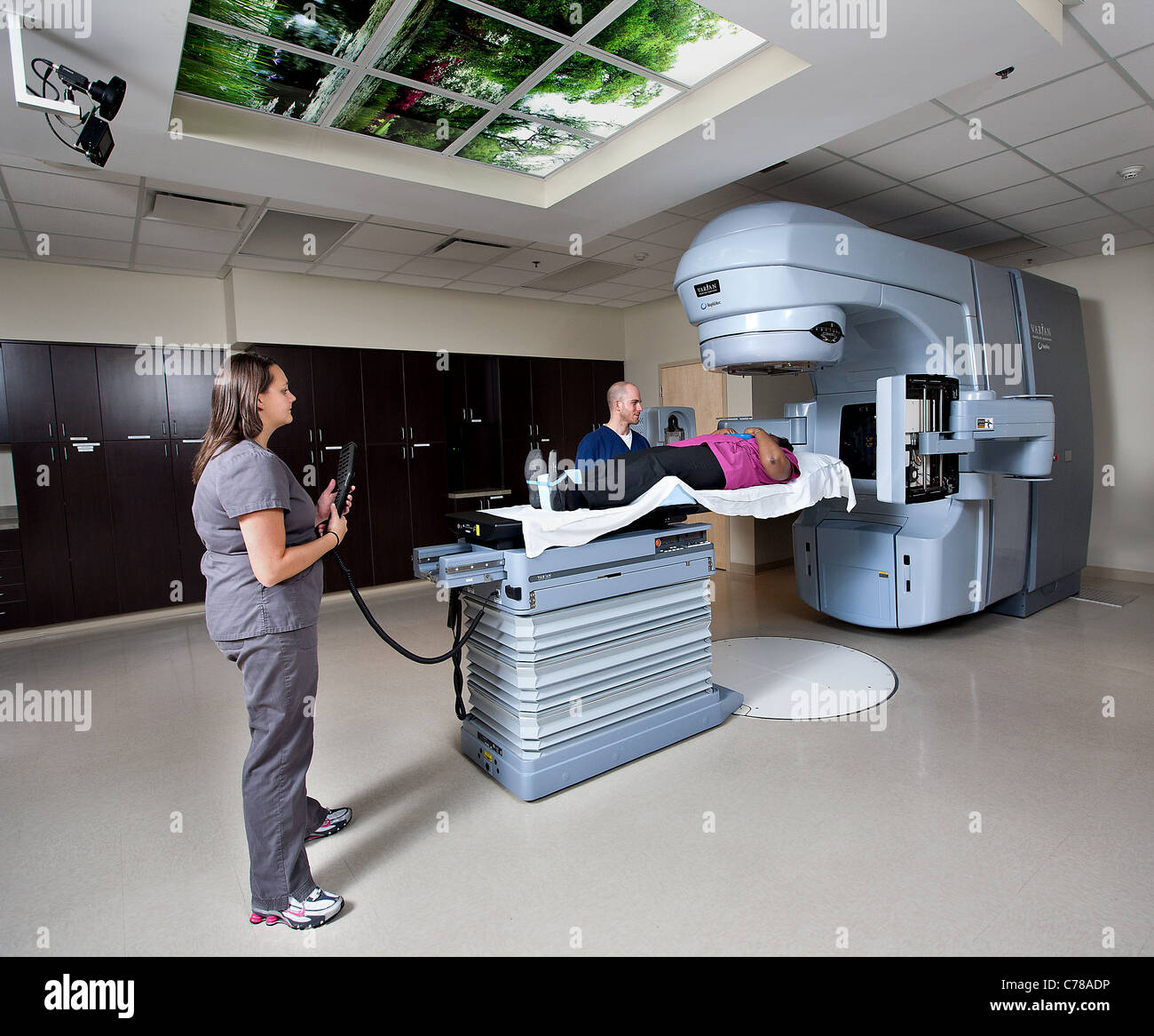 Nurse and patient in cancer center radiation room Stock Photo Alamy