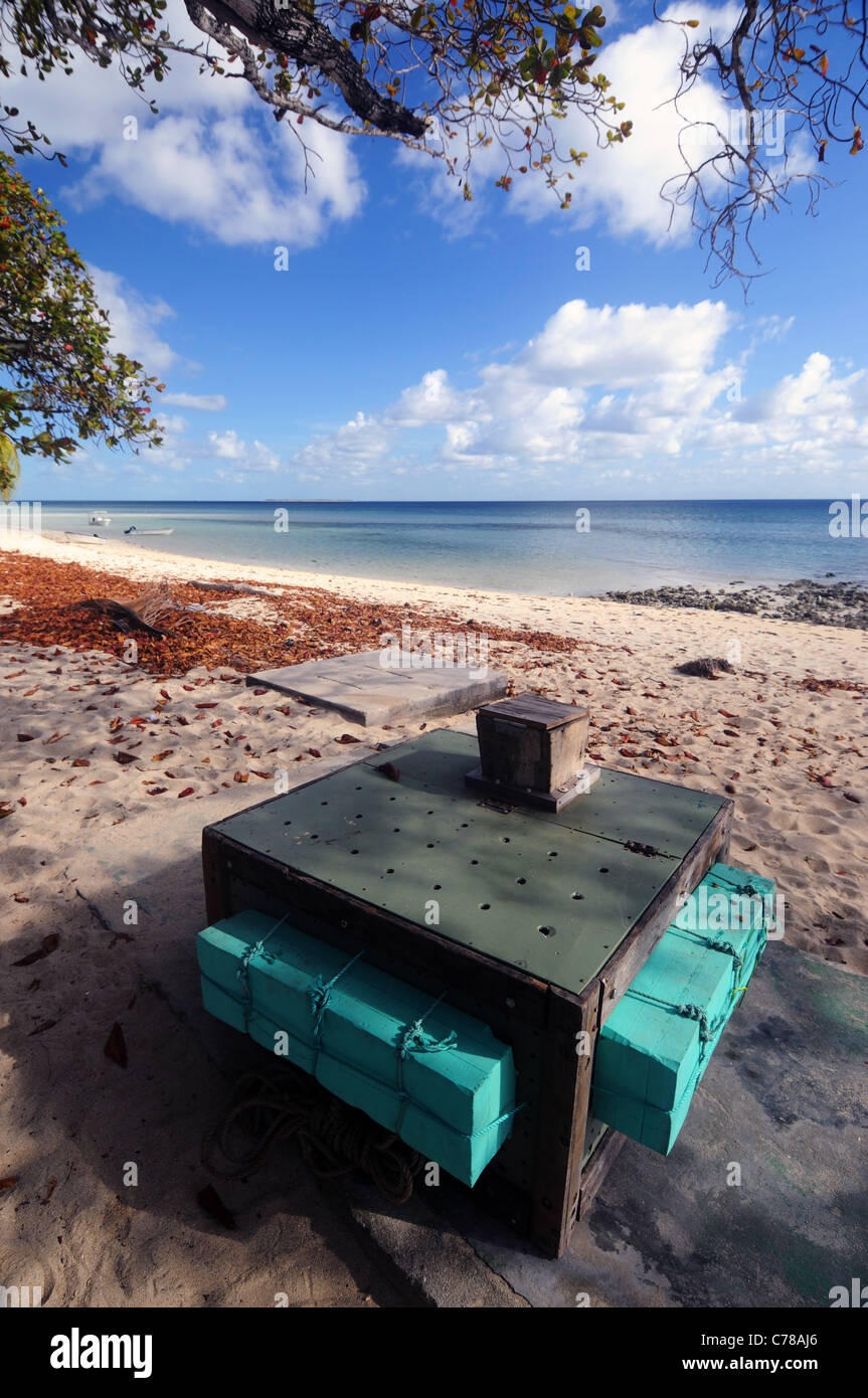 Homemade crayfish storage box, on the beach at Masig Island (aka Yorke Island), Torres Strait, Queensland, Australia. No PR Stock Photo