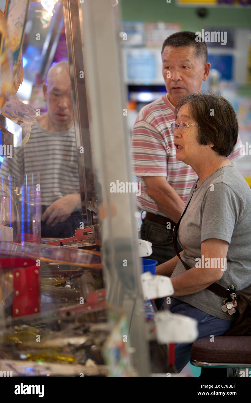 Elderly Japanese are increasingly spending their time and money in amusement arcades, Tokyo, Japan Stock Photo