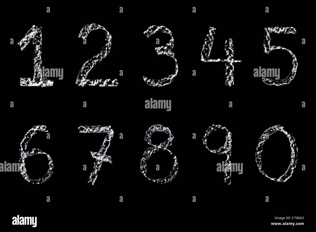 Handwritten numbers written on a blackboard in white chalk then cleaned up during editing and placed on a black background. Stock Photo
