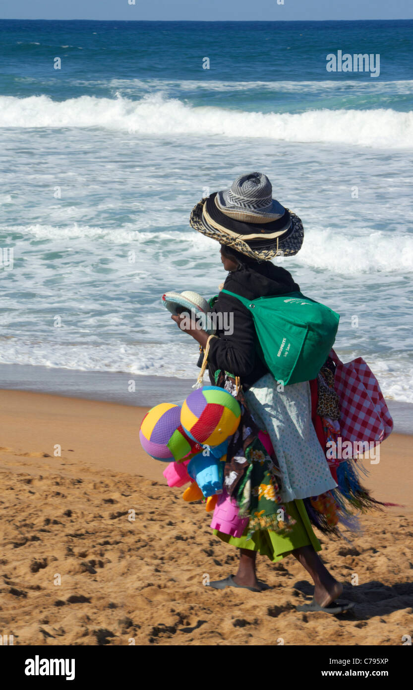 Woman selling goods on the beach at Amanzimtoti, KwaZulu-Natal, South Africa. Stock Photo