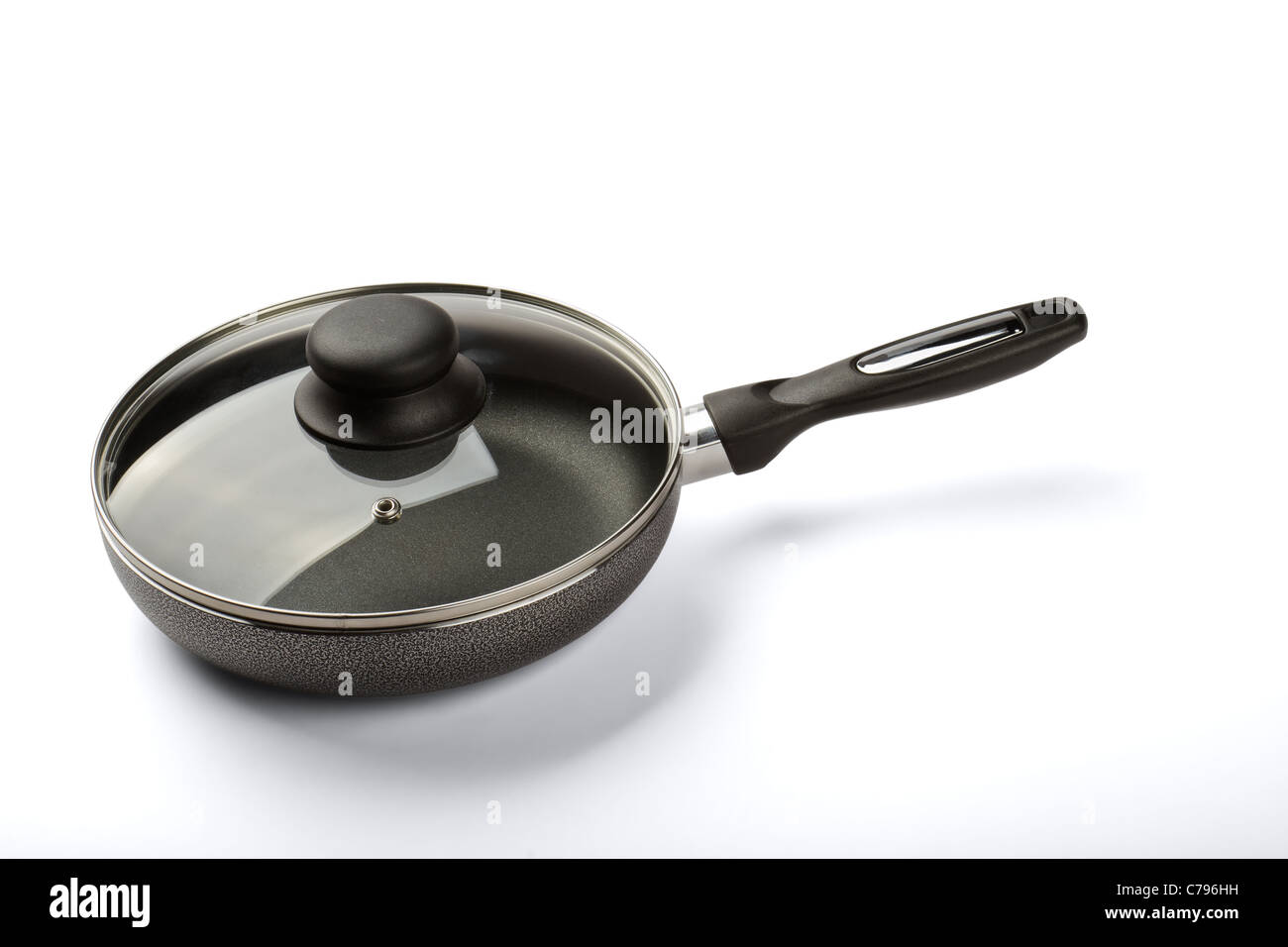 Frying pan with a teflon covering isolated on a white background Stock