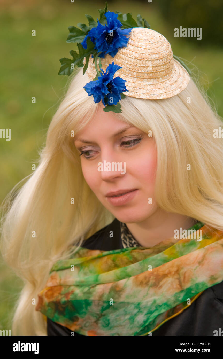 attractive young woman with a beautiful headdress Stock Photo - Alamy