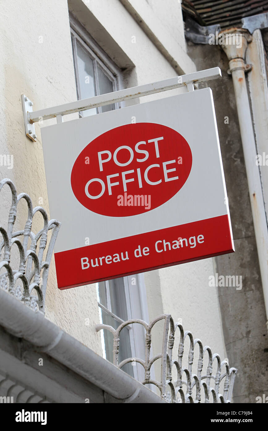 Post Office Bureau de Change sign hanging from a building in Lewes, East Sussex, UK. Stock Photo