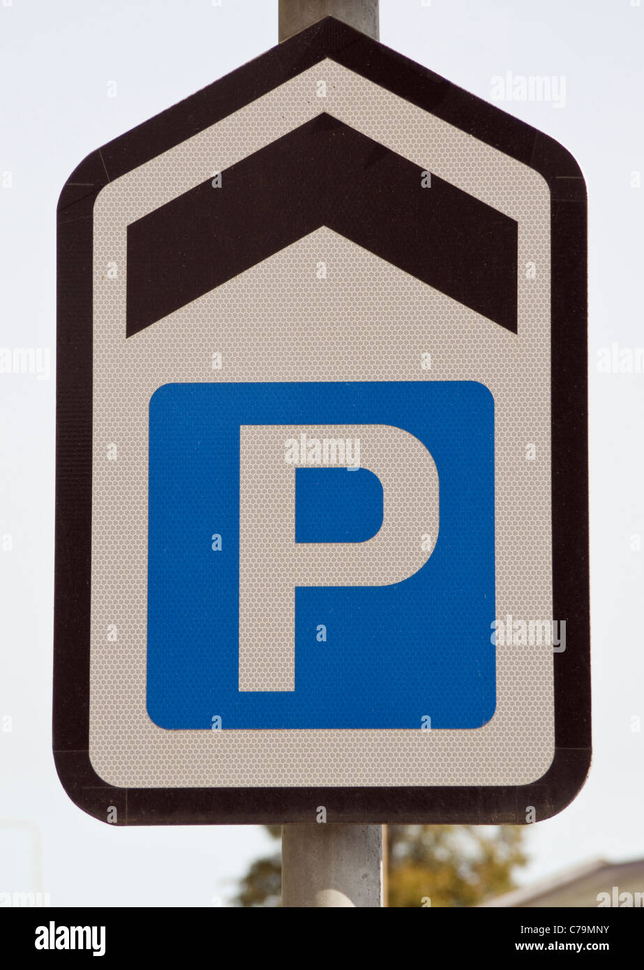 Blue and white parking direction sign for a car park straight ahead UK ...