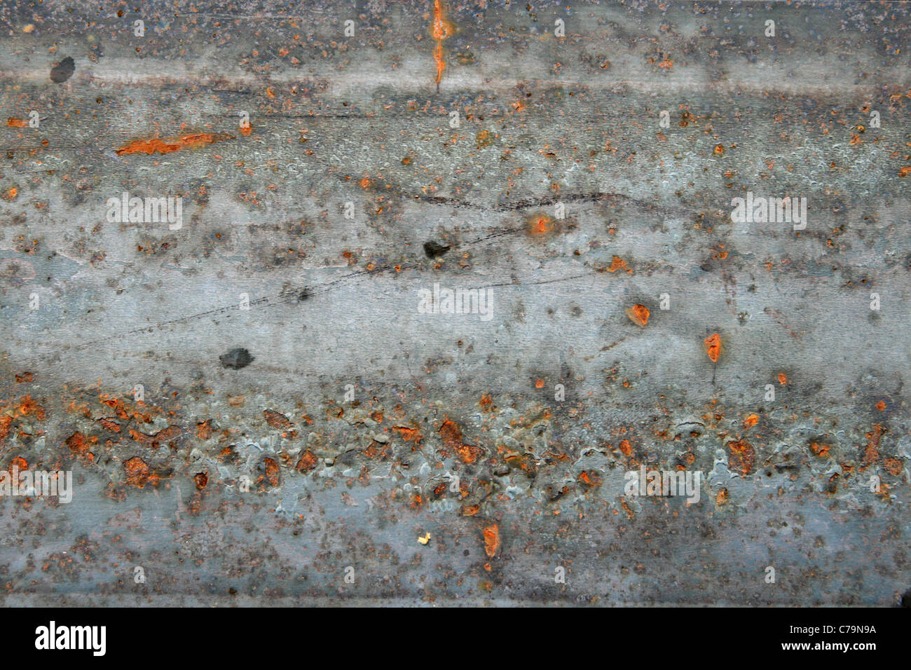scratched and rusty gray grunge metal background Stock Photo