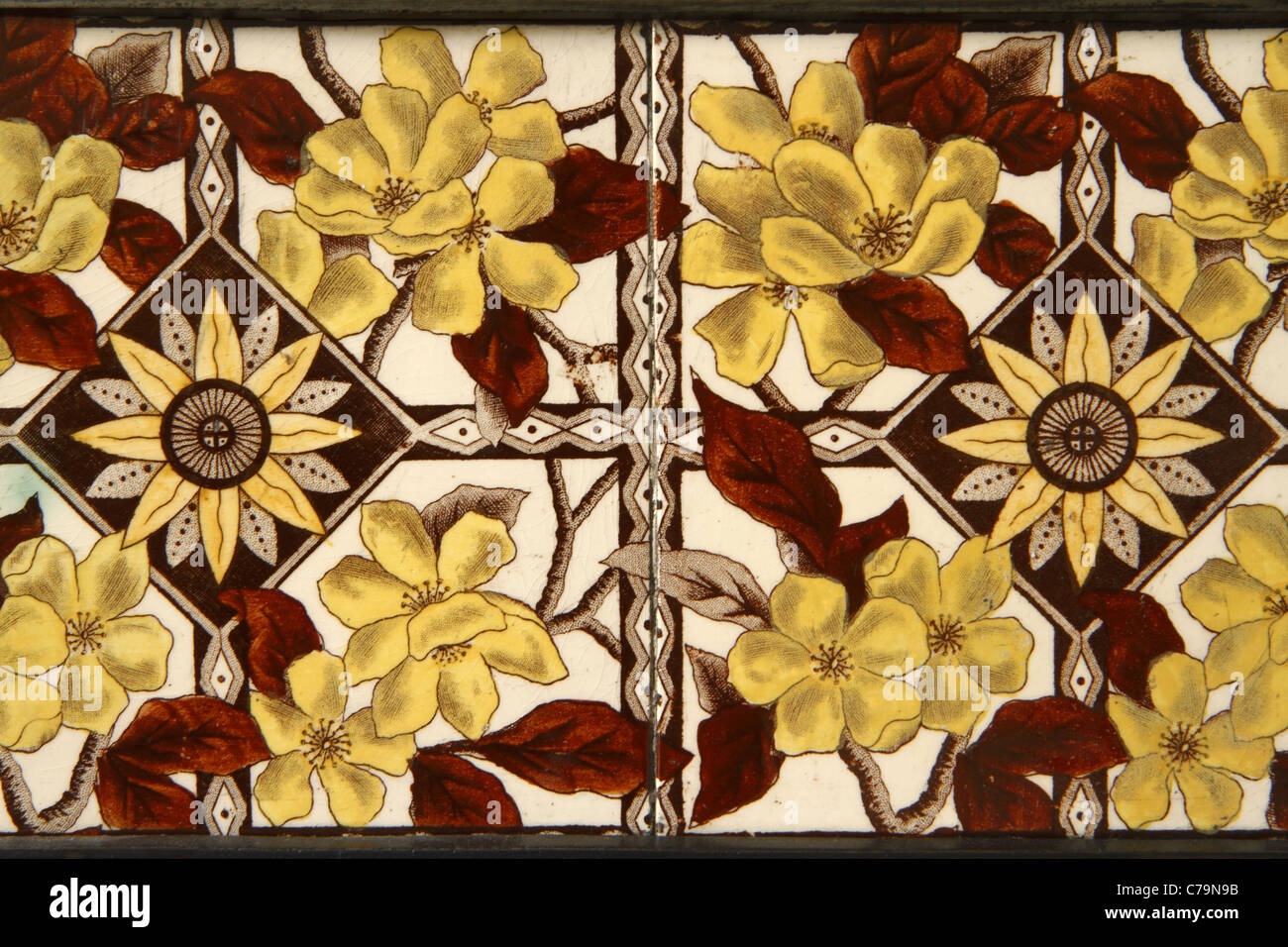 Ceramic tile detail of Victorian cast-iron fireplace Stock Photo