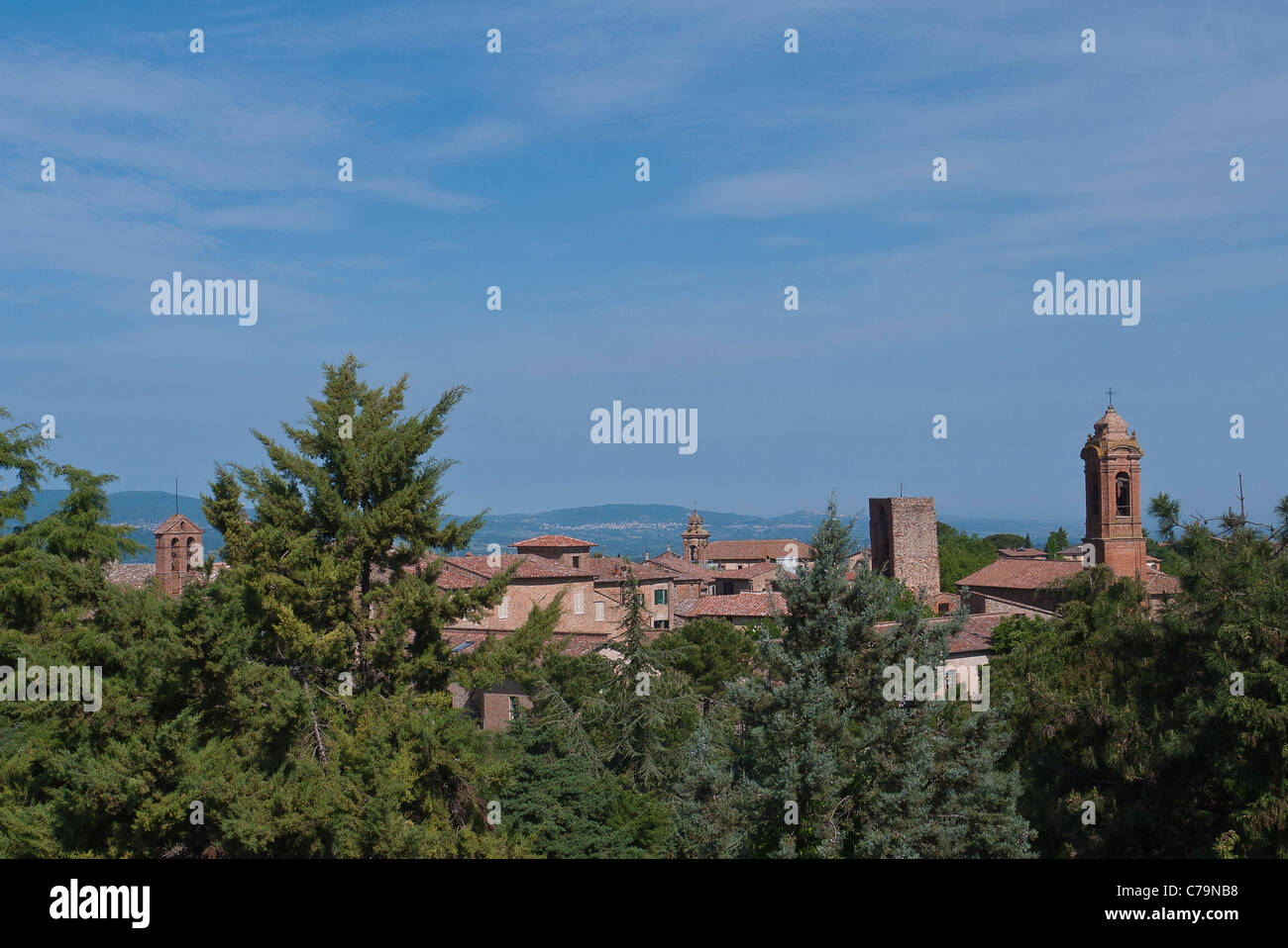 A tree top view of the roof lines and church belfries and historic tower of Citta della Pieve, Umbria, Italy. Stock Photo