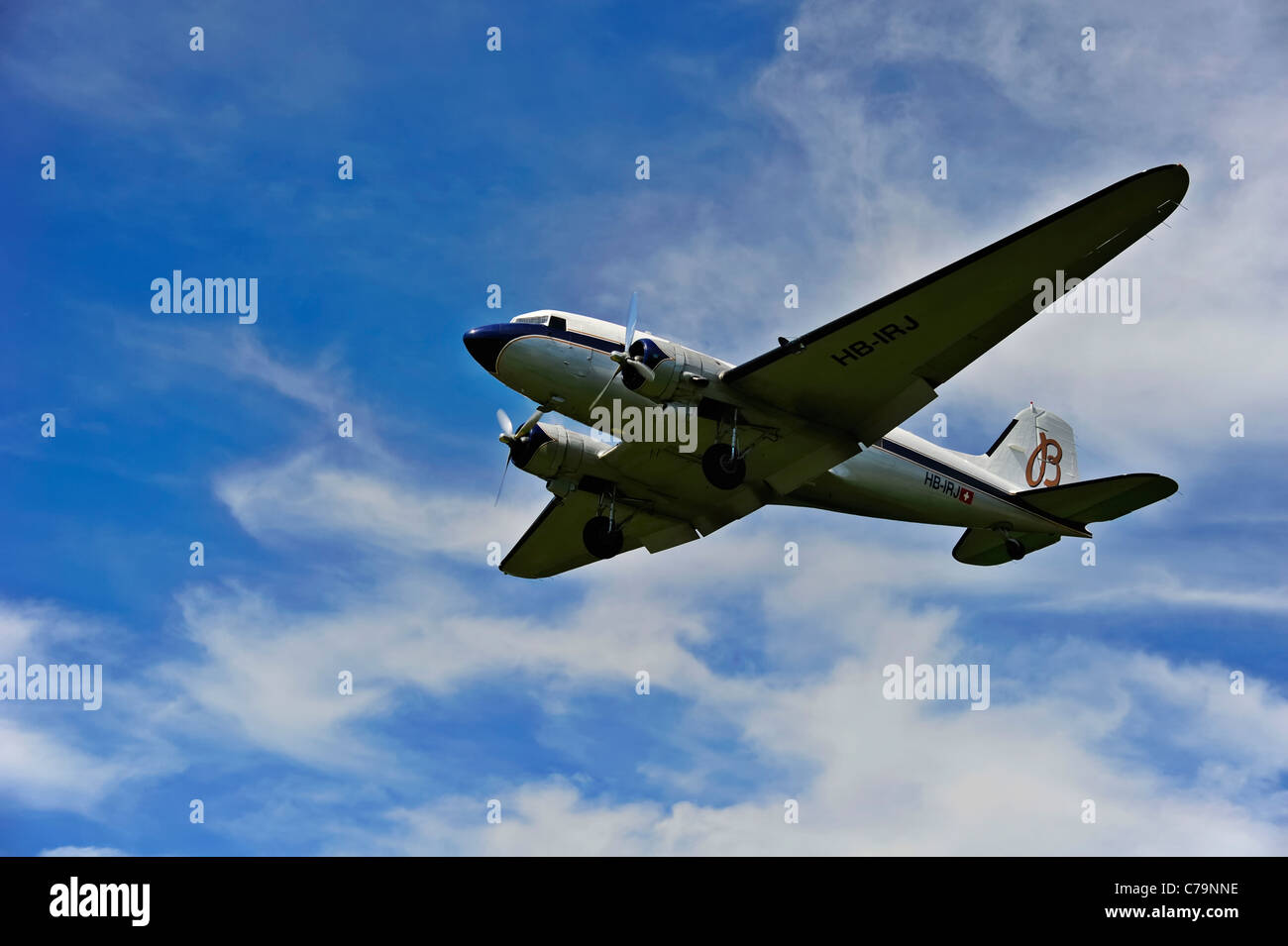 A vintage Douglas DC-3A coming in to land at an airfield Stock Photo