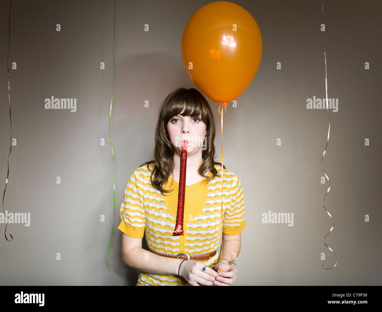 Party blower hi-res stock photography and images - Alamy