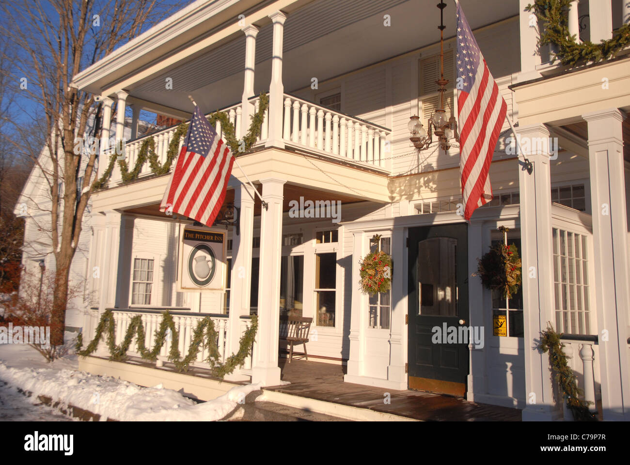 The high-end Pitcher Inn is graced by flags in the small town of Warren, VT. Stock Photo
