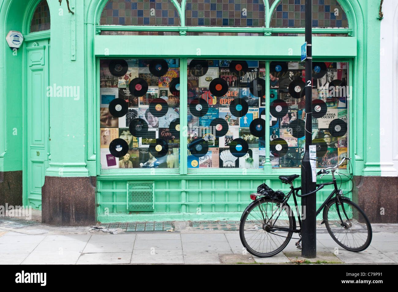 Vinyl records shop and bicycle, Bloomsbury, London, UK Stock Photo