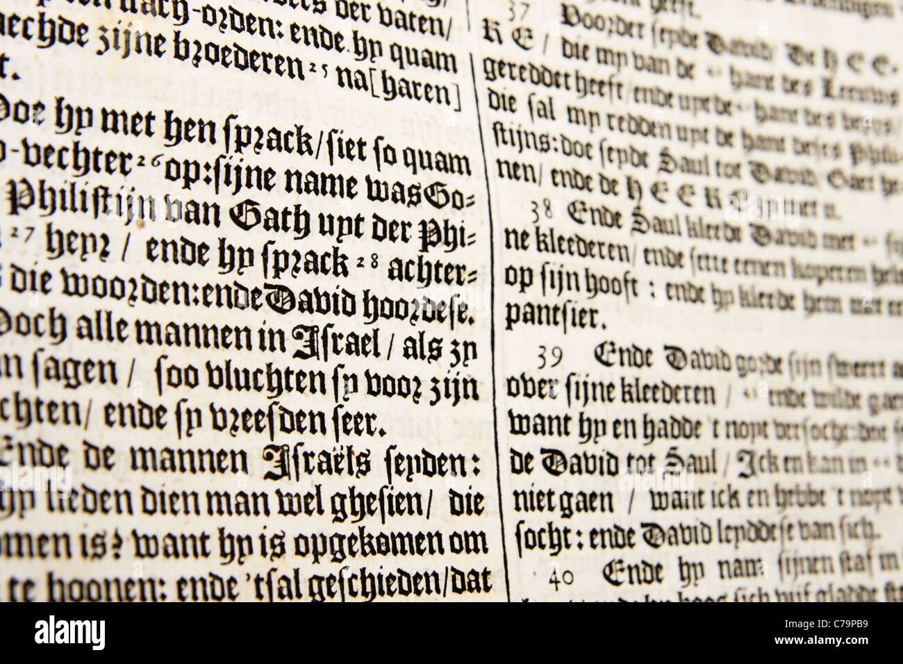 close up of old 17th century Dutch bible passage with shallow depth of field Stock Photo