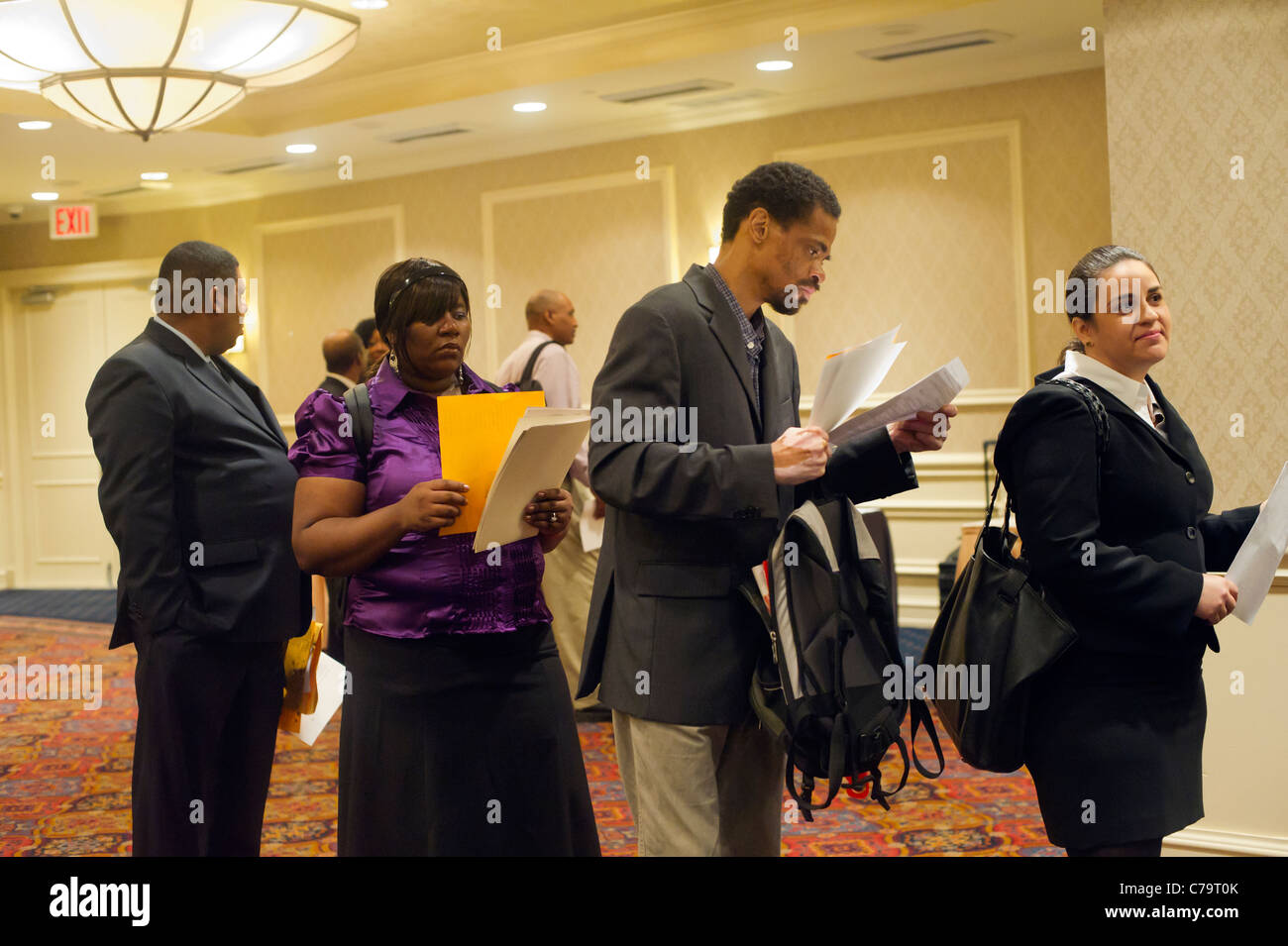 Job seekers attend a job fair in midtown in New York on Thursday, September 15, 2011. ( © Frances M. Roberts) Stock Photo