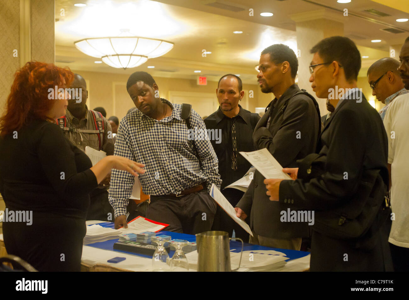Job seekers attend a job fair in midtown in New York on Thursday, September 15, 2011. ( © Frances M. Roberts) Stock Photo