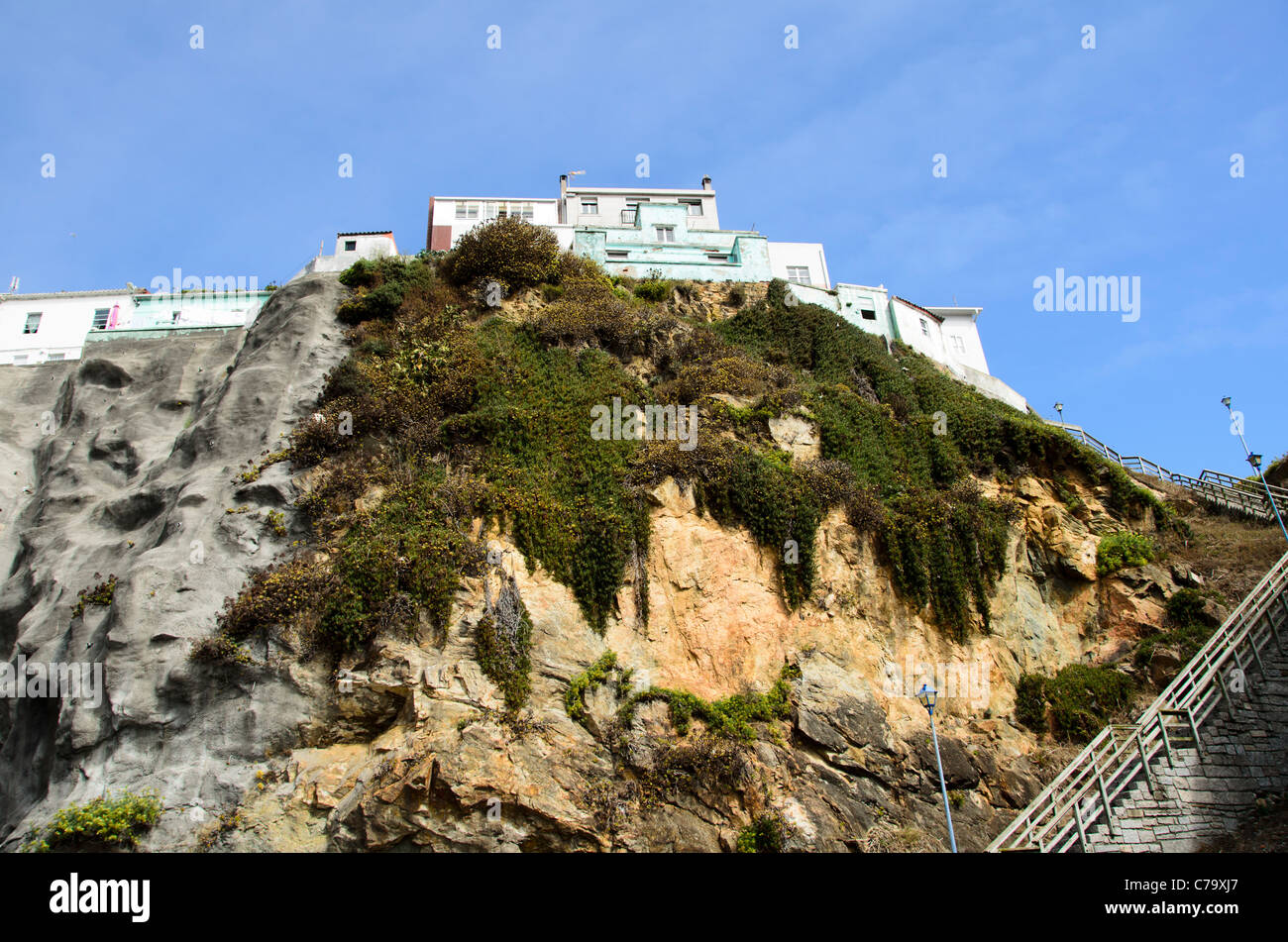 residential buildings over the cliff - Malpica de Bergantiños - Death coast - Galicia, Spain Stock Photo