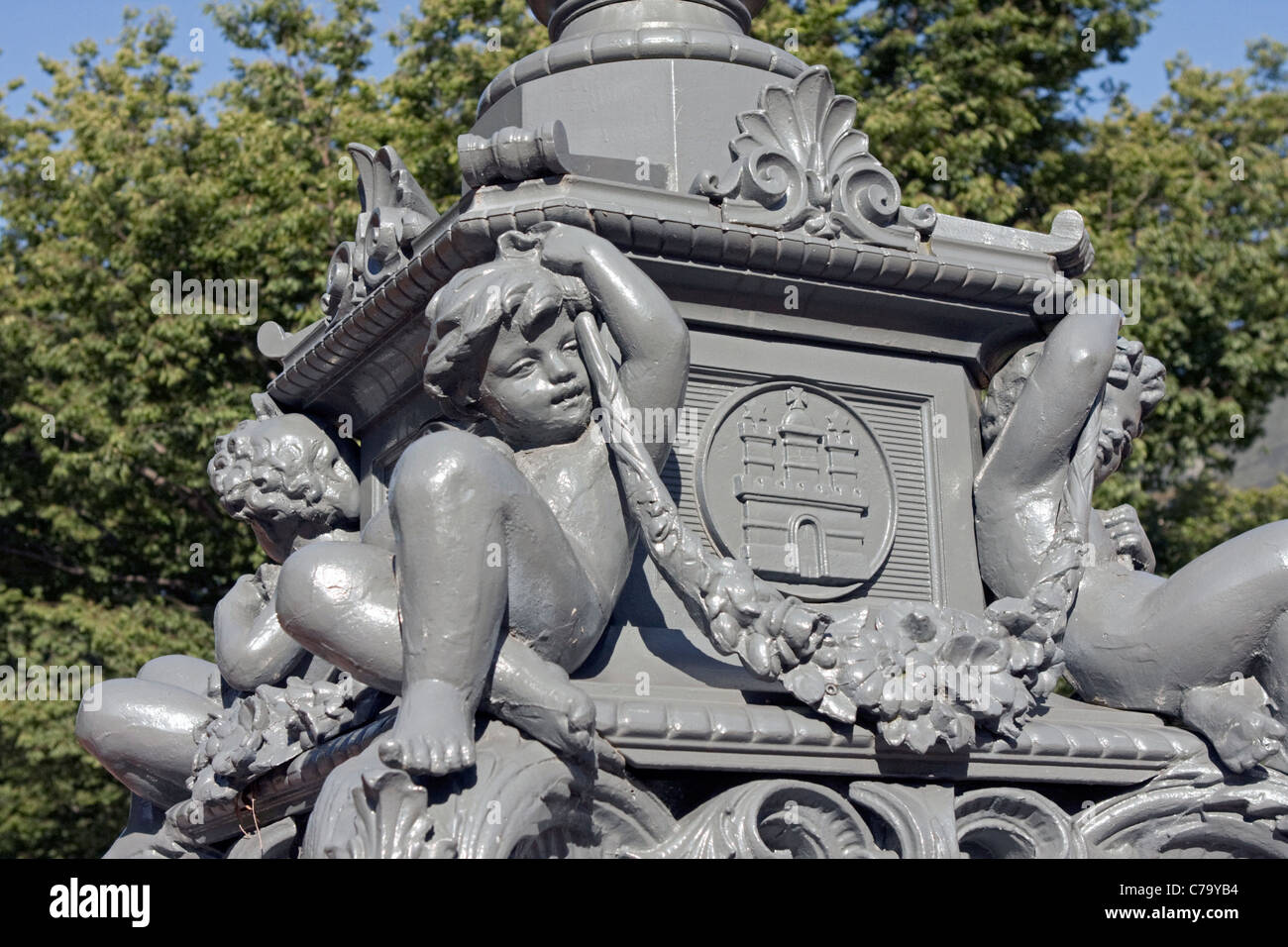 A statue in Kenmore Square in Boston features four cherubs. Stock Photo
