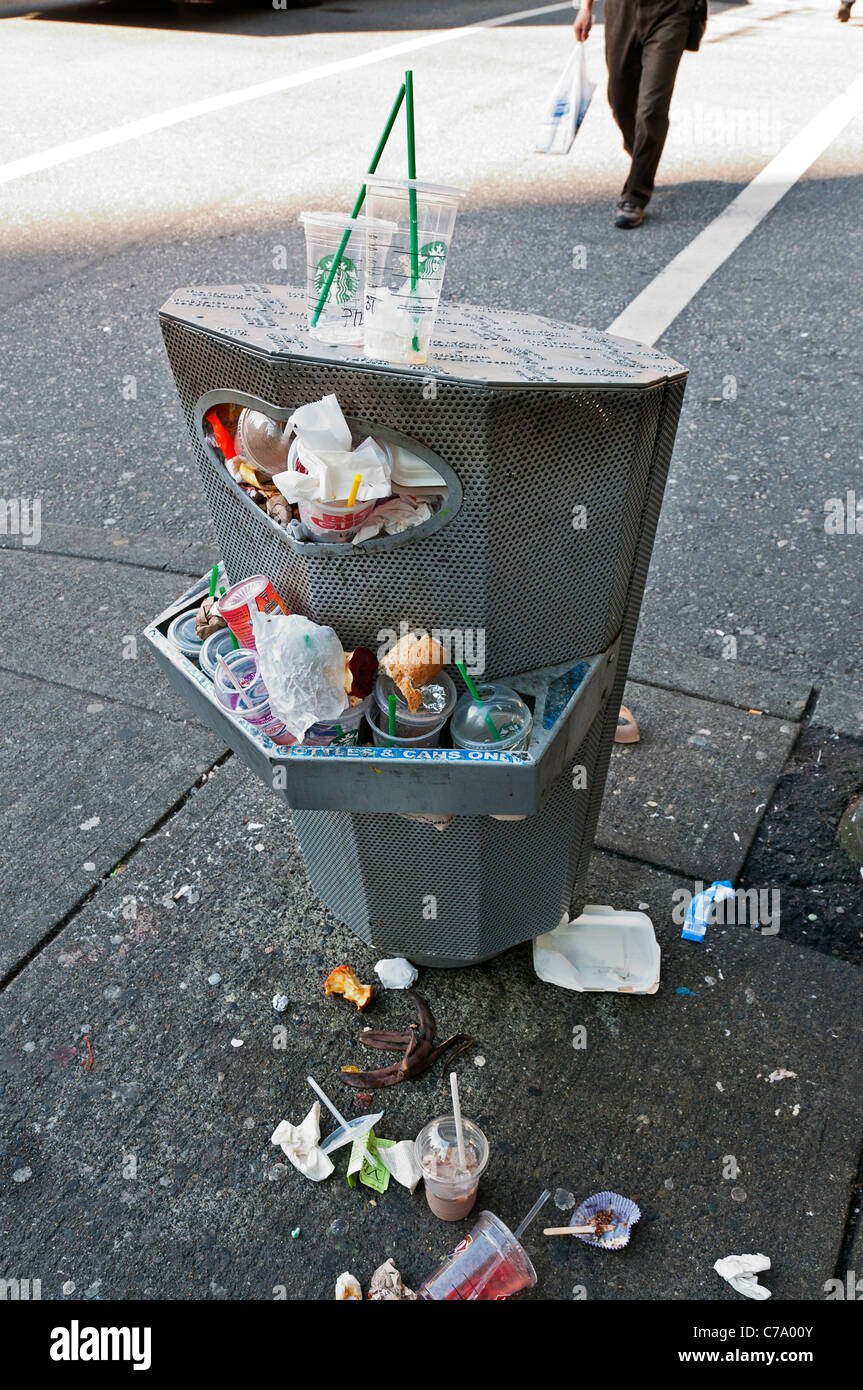 Overflowing public use garbage can, Burrard street, downtown, Vancouver
