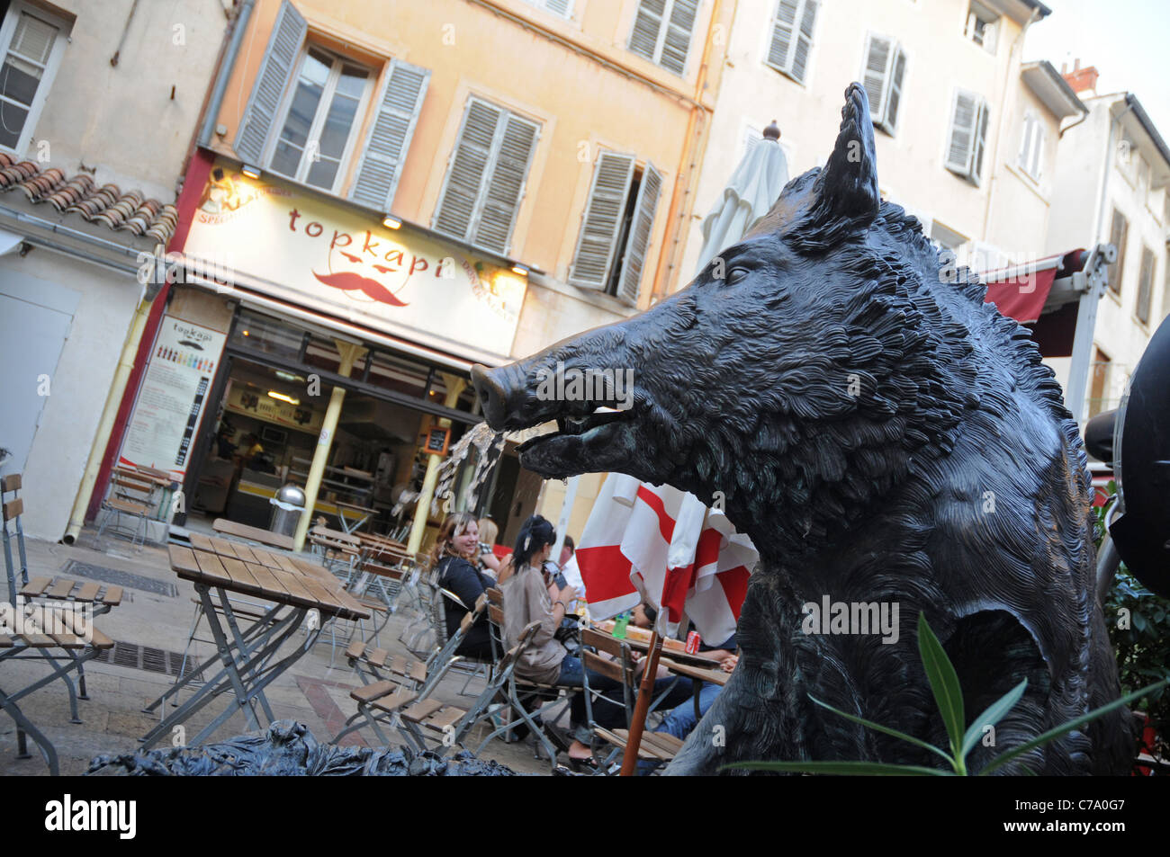 Bronze statue of boar on fountain at Place Richelme in Aix-en-Provence city in France Stock Photo
