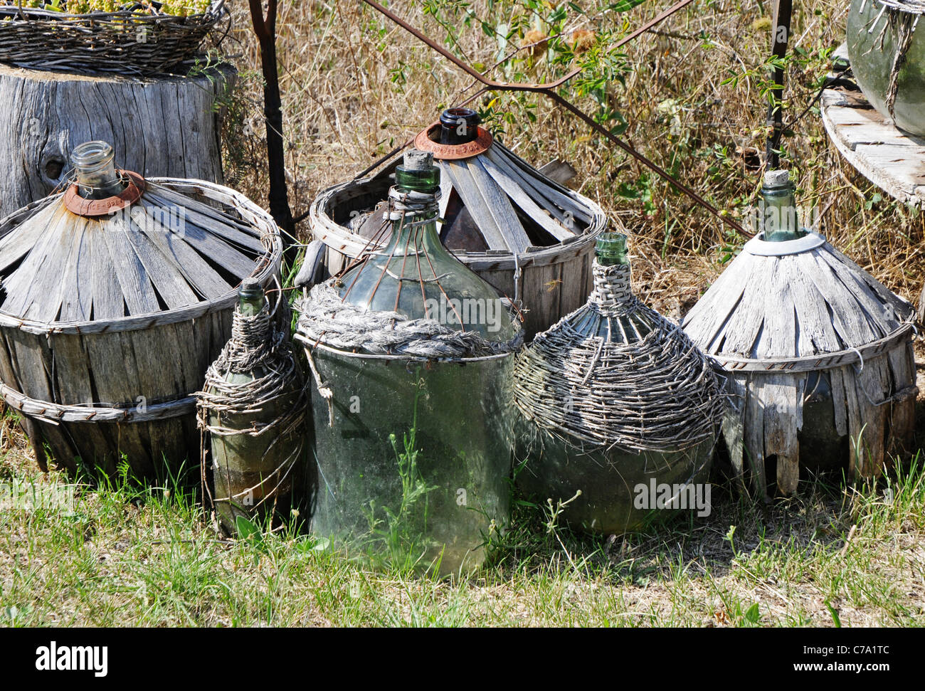 Old carboy bottles in garden, Provence, France Stock Photo Alamy