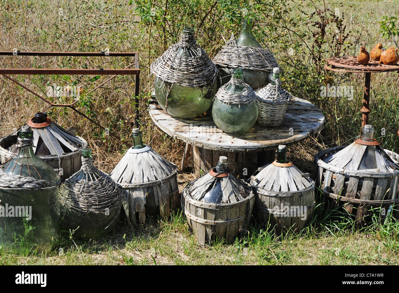 Old carboy bottles in garden, Provence, France Stock Photo Alamy