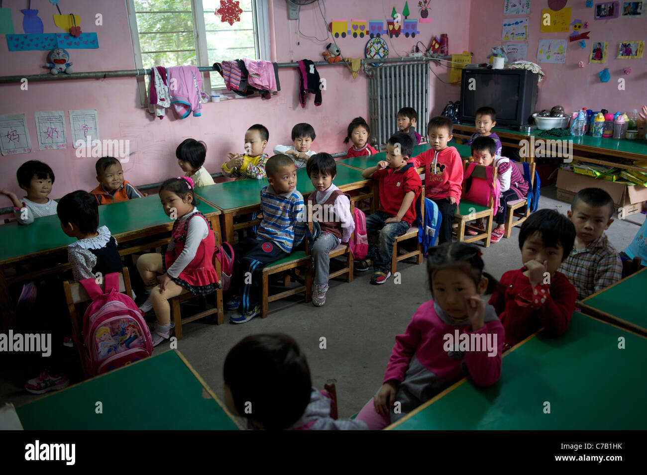 Children of migrant workers attend class at a kindergarten on outskirts of Beijing, China. 16-Sep-2011 Stock Photo