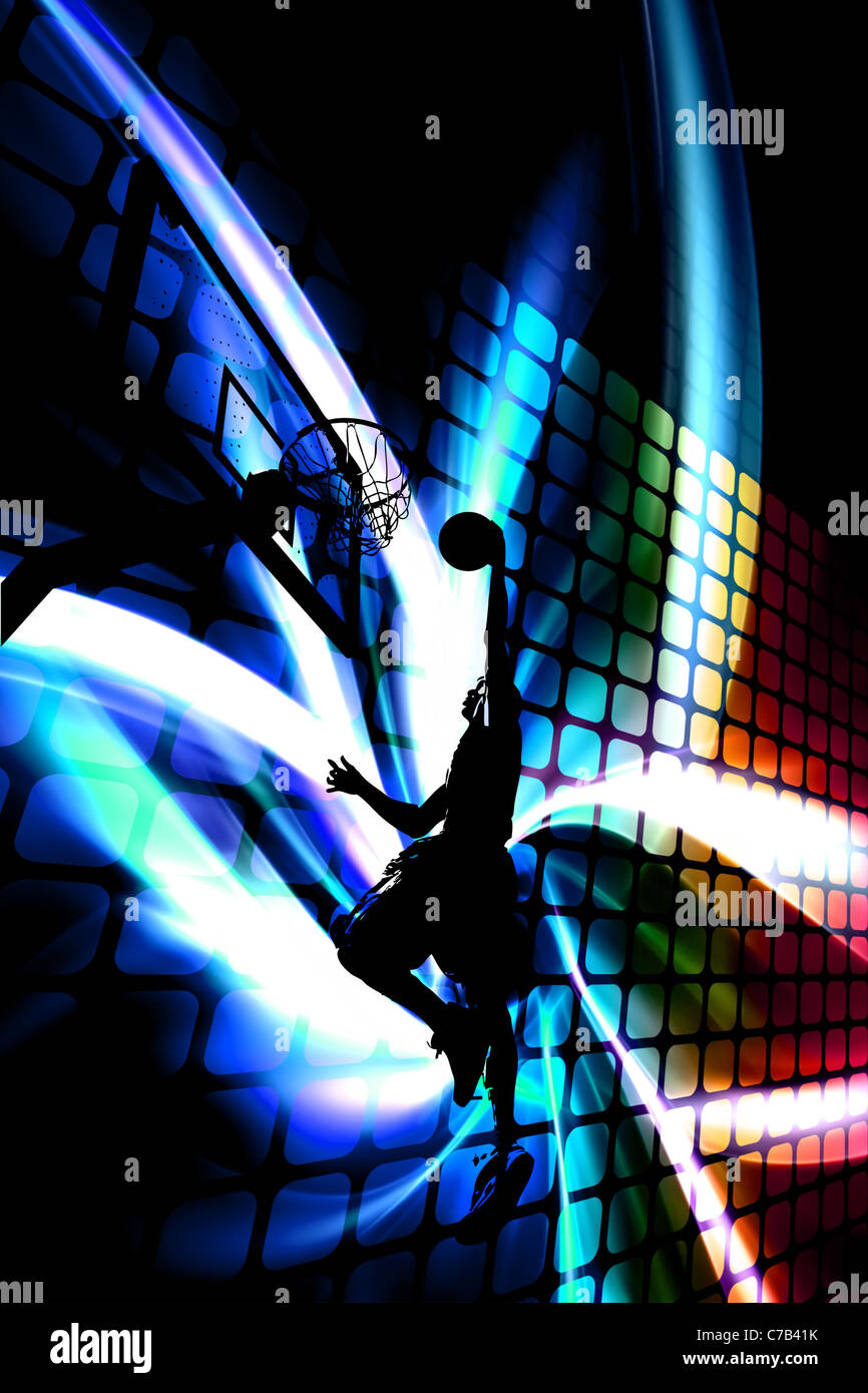 Abstract illustration of a silhouette of a man slam dunking a basketball over a background of rainbow colored artwork. Stock Photo