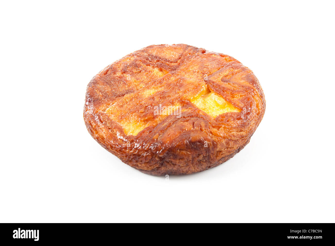 kouign amman breton butter yeast cake isolated on white background