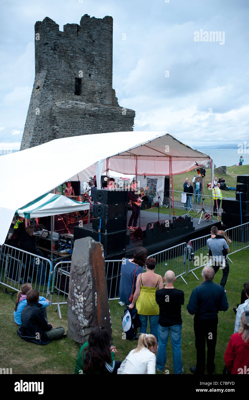 A band playing on stage, Roc y Castell / Castle Rock free music festival Aberystwyth Wales UK Stock Photo