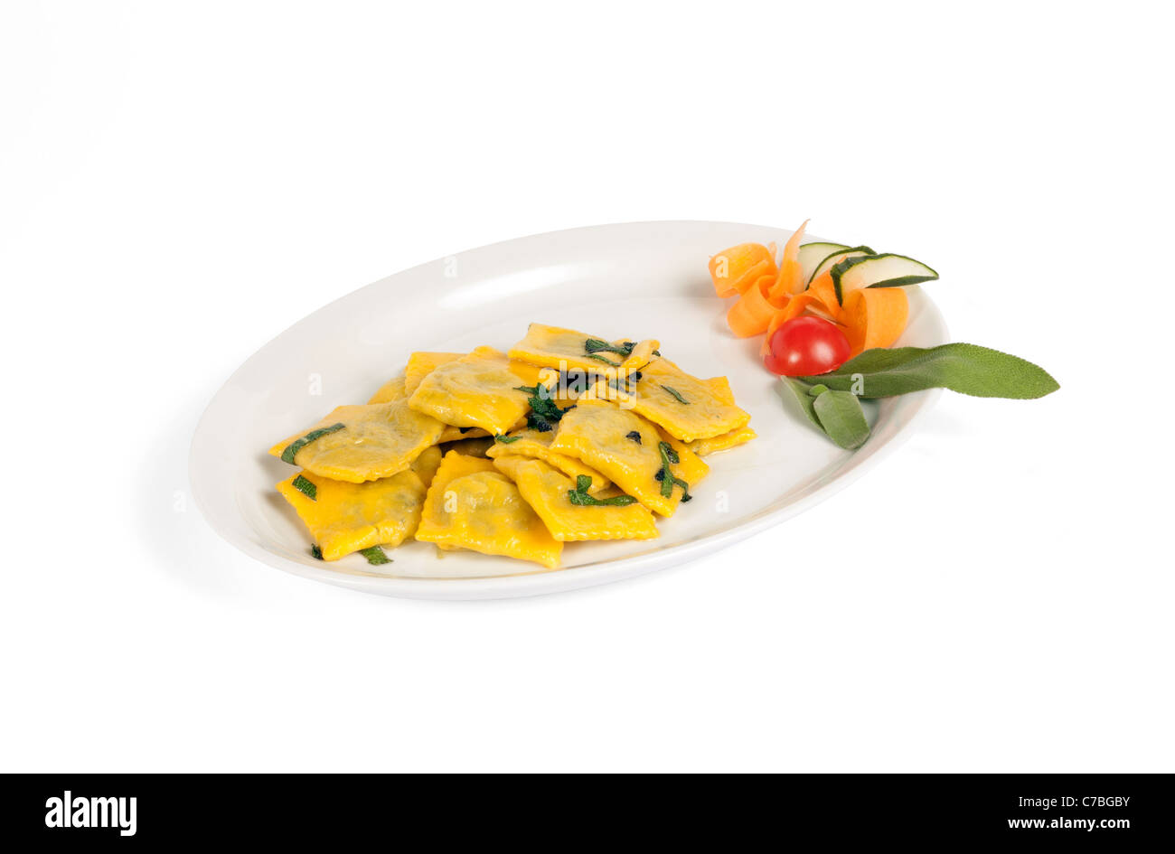 Italian cuisine, handmade ravioli with butter and sage Stock Photo